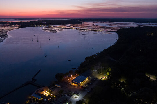 Aerial view of Port Royal, South Carolina and coastline after sunset at night.