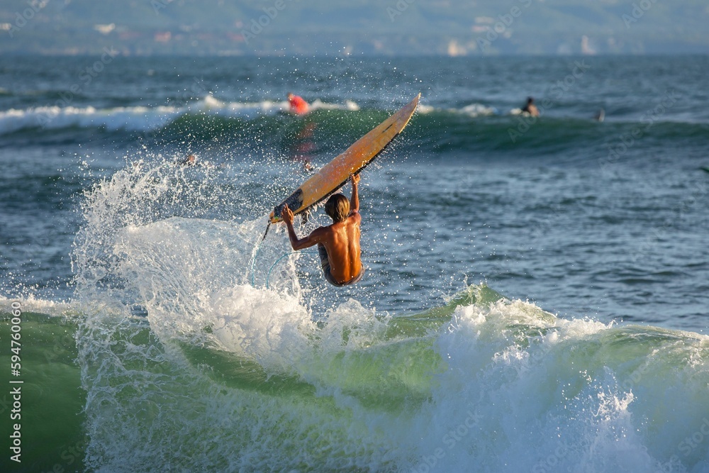 Sticker surfing themed photograph taken in bali, indonesia