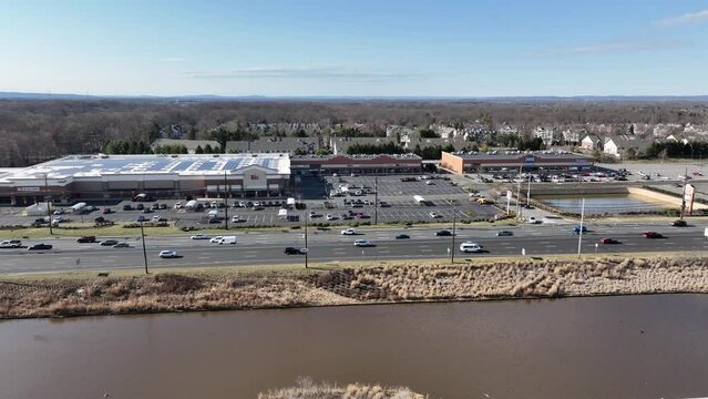 View over highways by parking lots and industrial areas in North Brunswick New Jersey