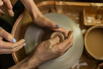 a potter creates handmade handicrafts