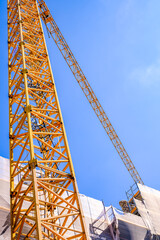 Fototapeta na wymiar modern crane at a construction site