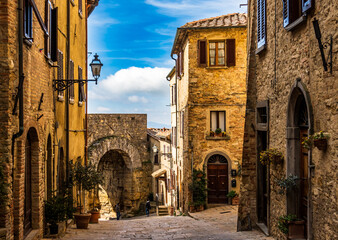 historic buildings at the old town of Volterra in italy