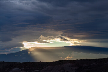 The Grand Mesa seen from the Grand Valley, Colorado through falling rain with a break in the clouds