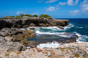 Fototapeta na wymiar Barbados Ocean and rocks Next to Animal Flower Cave. Atlantic Ocean. Caribbean Sea Island