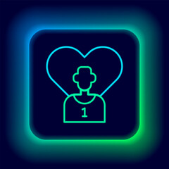 Glowing neon line Football or soccer player icon isolated on black background. Colorful outline concept. Vector
