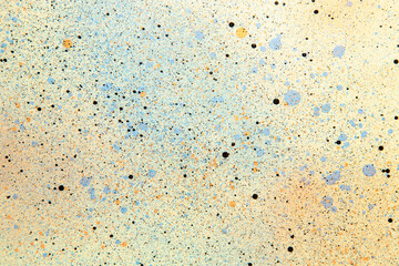 above view white surface with blue and orange paints painting photo horizontal color dust art