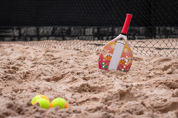 Beach Tennis for kids. Beach Tennis Kids. Family beach tennis. Mother and daughter at beach tennis. copy space - horizonta