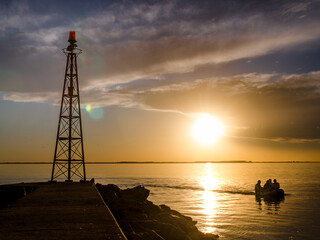 Obraz na płótnie Canvas lighthouse at sunset