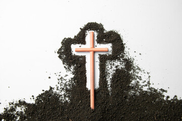 top view stick cross with dark soil on the white background funeral death grim reaper