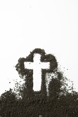 top view of cross shape with dark soil on the white background grim reaper funeral death devil