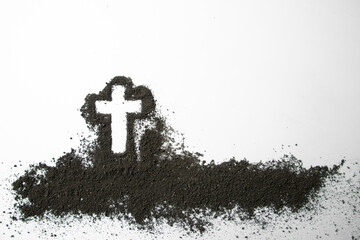 top view of cross shape with dark soil on white background grim reaper funeral death devil