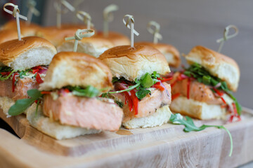 Sous Vide Grilled Salmon Sliders with Mango Relish, Pepper Lsaw, on Brioche Bread