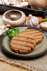 Tasty vegetarian burgers made from healthy quinoa, basil, portobello champignon and shiitake mushrooms