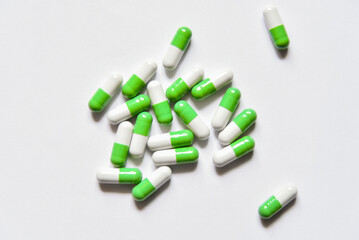 Pile of pills, medications on a white background