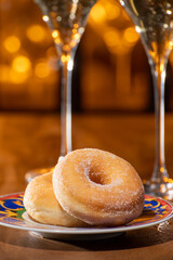 Fresh baked doughnuts or donuts sweet dessert americal style glazed with sugar