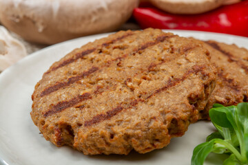 Tasty vegetarian burgers made from healthy quinoa, basil, portobello champignon and shiitake mushrooms