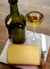 Wine and cheese pairing, local Comte cheese produced in the Franche-Comte region and special and...