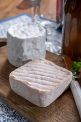 Cheese collection, Belgian soft yellow cow milk cheese with white mold from Bruges and bouquet des moines from Abbey of Val-Dieu