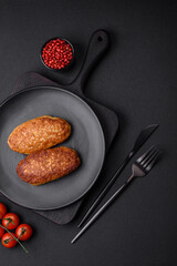 Delicious fried cutlets or meatballs from minced fish with spices and herbs