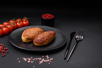 Delicious fried cutlets or meatballs from minced fish with spices and herbs