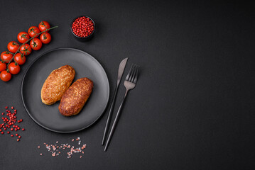 Delicious fried cutlets or meatballs from minced fish with spices and herbs