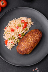 Delicious fried cutlets or meatballs of minced fish with rice