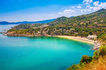 Fototapeta na wymiar Tosca sand beach and blue water near Kavala, Macedonia, Greece, Europe
