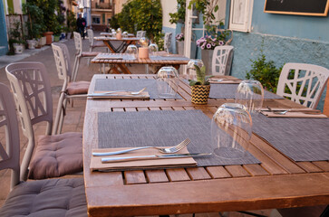 Historic center of the old town of Calpe.Calpe town with colorful houses and restaurant terraces.A place to eat in restaurants on a terrace street.Spain
