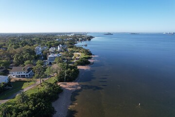 A beautiful drone photo of Crystal Beach Pier, a community park with a fishing pier in Tampa Bay.