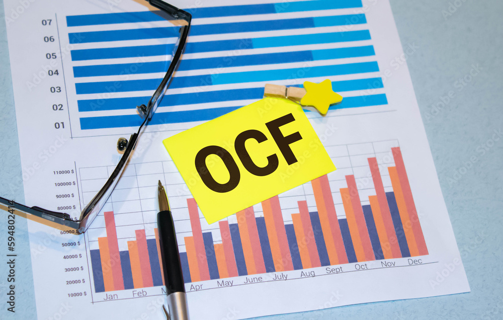 Poster oce text written on notepad on the blue background