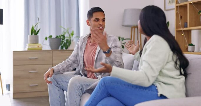 Marriage crisis, conflict, couple on sofa with problem fight in living room of home with anger and shouting. Divorce discussion, woman and man on couch in sad, angry argument with drama or depression