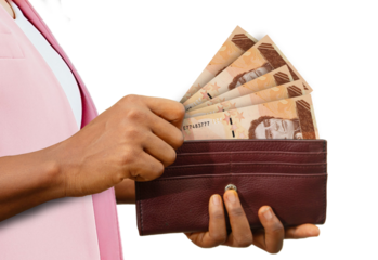 fair Female Hand Holding brown Purse With Venezuelan bolivar notes, hand removing money out of purse isolated on white background
