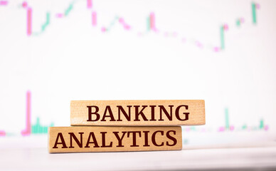Wooden blocks with words 'Banking analytics'. Business concept