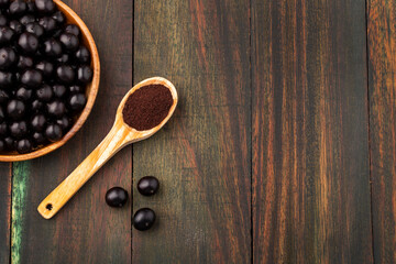 Acai berry powder in spoon - Euterpe oleracea
