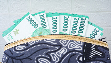 Indonesian money - rupiah in the batik wallet