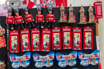 Fototapeta premium Souvenir fridge magnets depicting Big Ben and a red telephone booth