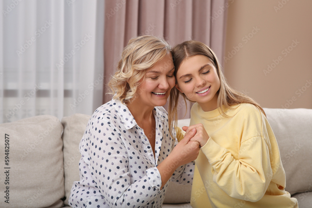 Poster Young woman with her mom at home. Happy Mother's Day