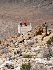 Visitors on the viewing platform of Meteor Crater in Winslow, Arizona
