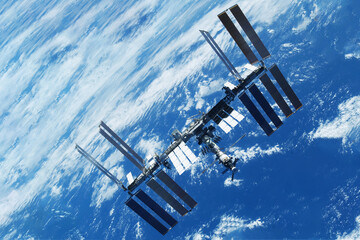International Space Station above the Earth. Elements of this image furnished by NASA
