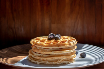Tasty Breakfast with Wood-Fired Waffles and Fresh Blueberries