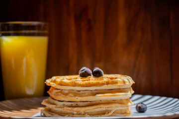 Tasty Breakfast with Wood-Fired Waffles and Fresh Blueberries