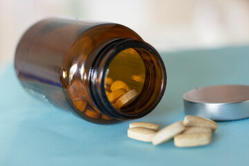 brown bottle of vitamins, supplement food, helth