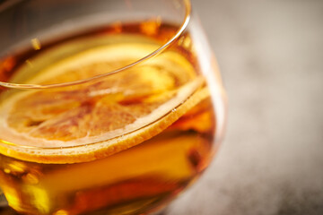 Fruit tea in a cup, dried orange tea