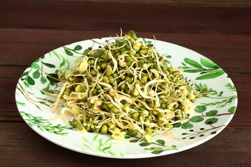 heap of sprouted green mung or moong beans also known as green gram beans for indian gujarati food or salad