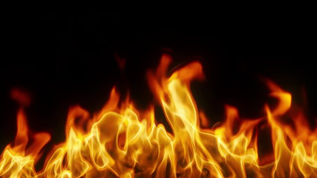 Realistic flames of fire on a transparent background. Video of flames and fiery patterns. 4K Smooth looping animation.