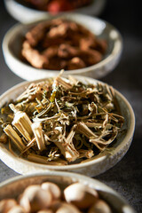 Various kinds of herbal medicines on a plate	