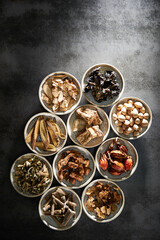 Various kinds of herbal medicines on a plate	