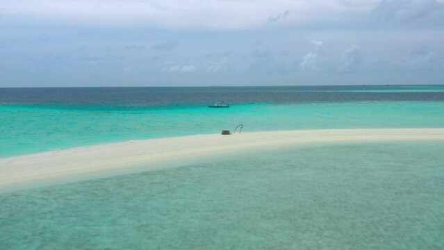 Aerial view on tourist boat next to the sandbar in the Vaavu atoll, Maldives.