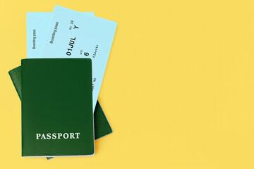 Green passports, flight boarding pass, airline tickets, airplane travel concept, passenger check in, customs control, border cross, summer holidays, vacation, international tourism banner, copy space