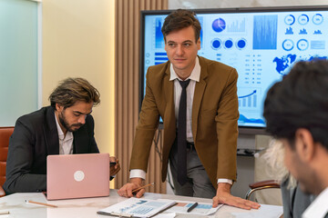 Team work. Businesswoman and man working and having a discussion in the meeting room